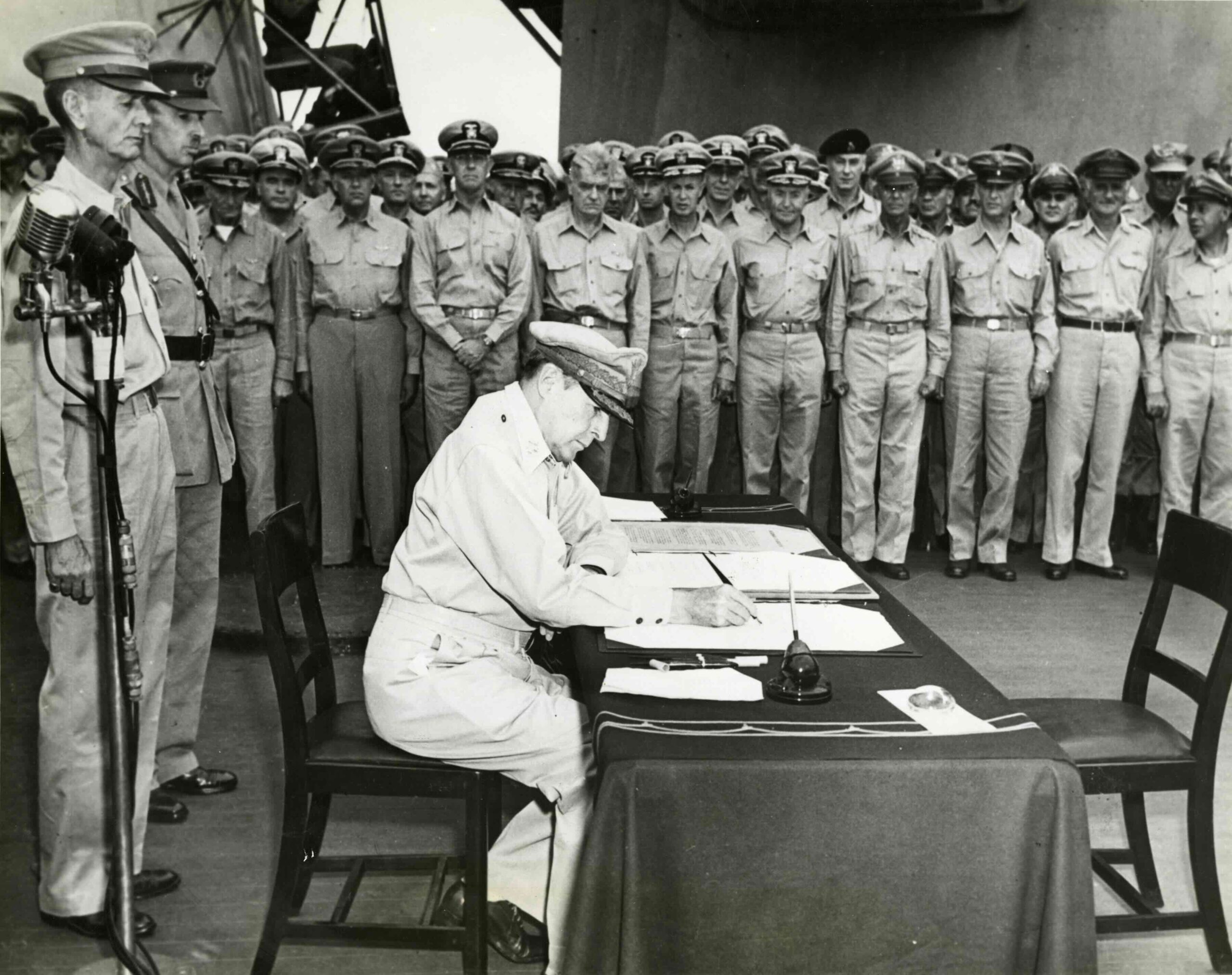 General Douglas Macarthur Signing Japans Surrender Tokyo Bay 2 September 1945 Scaled WW II Archive The Pacific Theater: Titans of the Ocean (1941–1945)